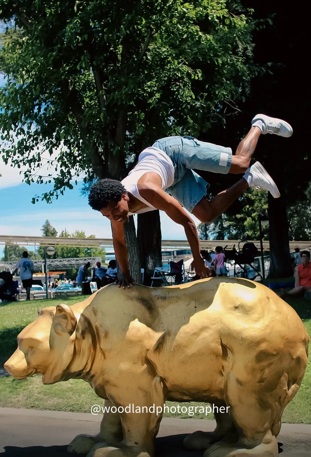 Vonté Smith — Vaulting over a bear statue in the park