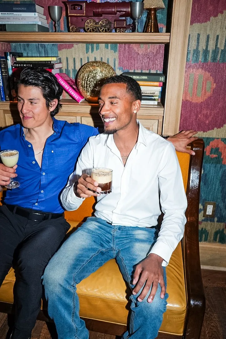 Vonté Smith — Laughing with a friend over drinks
